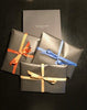 Uld tørklæde i klar blå og sort fra Moschino